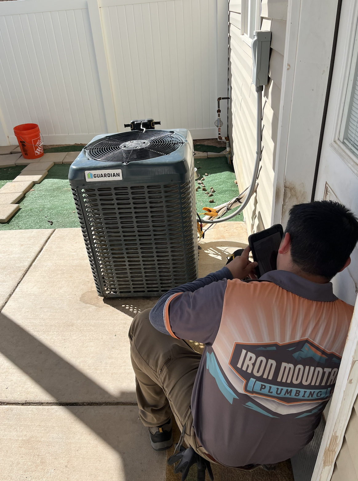 HVAC technician working on an AC for HVAC repair Cedar City